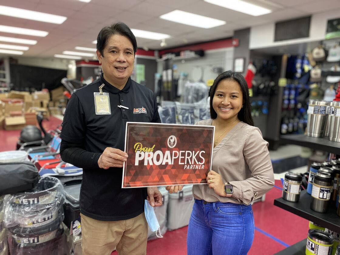 All Star Sporting goods staff pose for a photo