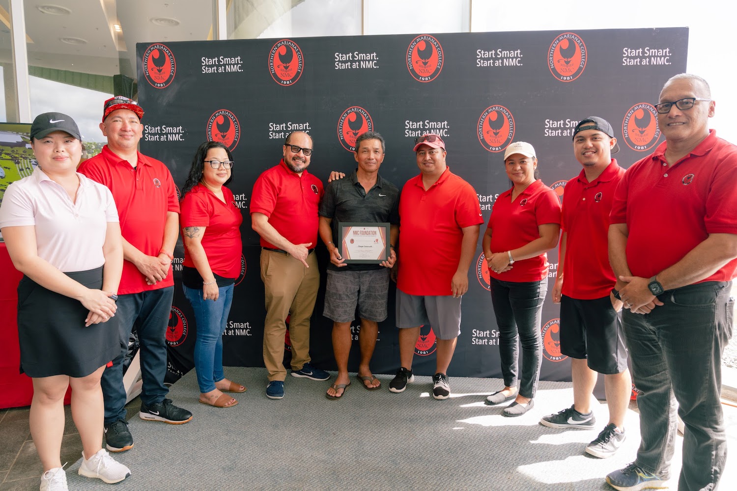 Joseph Sasamoto, center and the Senior Flight winner of the 17th Annual NMC Foundation Golf Tournament, poses with, from left, Northern Marianas College regents Michelle Lin Sablan, Jesse Tudela, and Zenie Mafnas, NMC president Galvin Deleon Guerrero, Gov. Ralph DLG Torres, NMC regent Irene Torres, NMC Foundation board member Roman Tudela, and NMC Board of Regents chair Charles Cepeda during the awards ceremony last Saturday at the Laolao Bay Golf & Resort. (NMC)