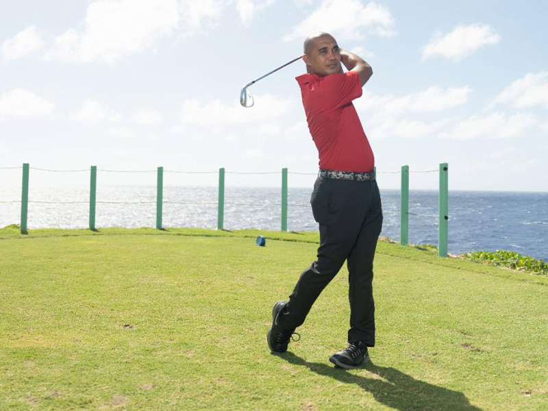 Franco Santos tees off on the East Course of the LaoLao Bay Golf and Resort. 