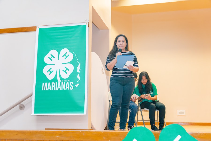 Natasha Nogis Tomokane speaks during the proclamation signing for National 4-H Week at the Kagman Community Center on Wednesday. 