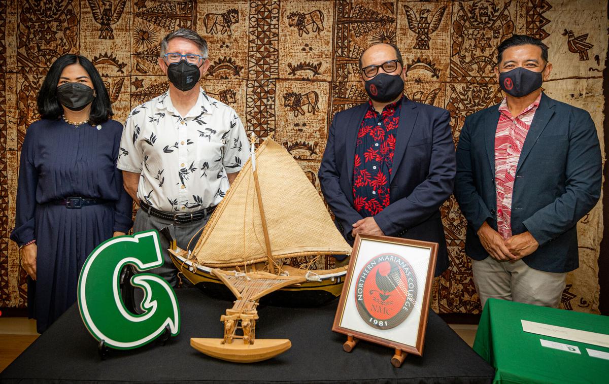 From left, Anita Borja Enriquez, senior vice president and provost, University of Guam; Thomas W. Krise, president, UOG; Galvin Deleon Guerrero, president, Northern Marianas College; and Frankie Eliptico, vice president of administration and advancement. NMC. UOG photo