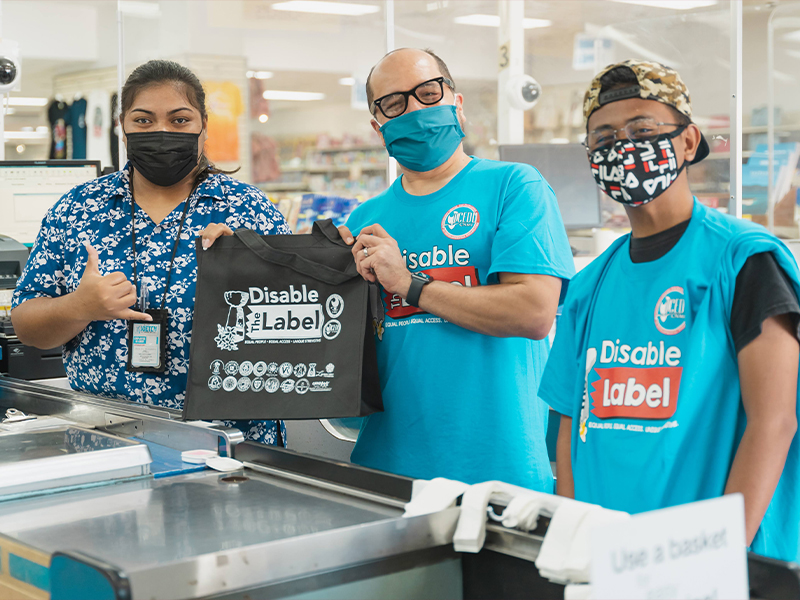 Northern Marianas College's new President Dr. Galvin Deleon Guerrero was one of the celebrity baggers during the “Disable the Label” Celebrity Bagging event held Saturday to help raise awareness about equality, equity and the need to remove labels to create an inclusive environment by way of recognizing unique abilities.