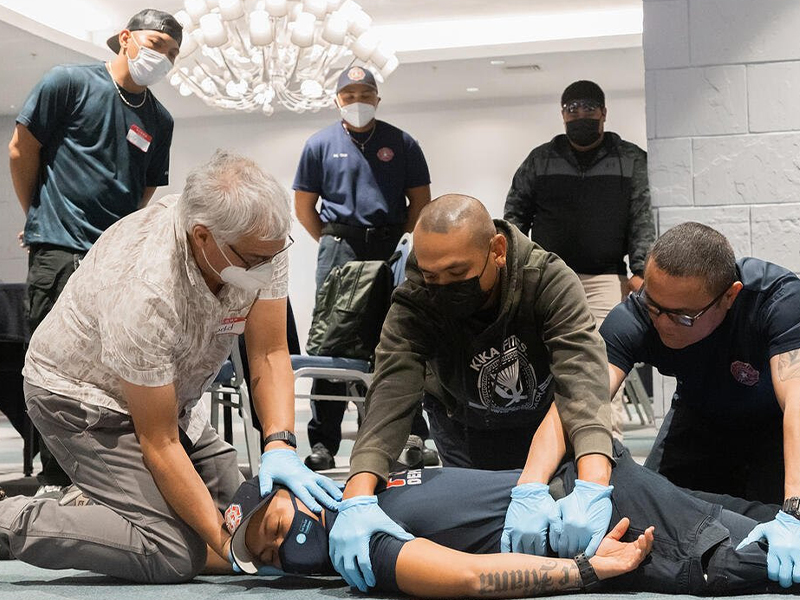 During a hands-on activity, Dr. Todd Miner of the University of Colorado showed participants how to properly do a log roll.