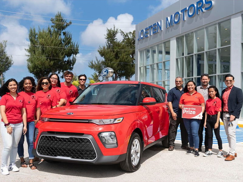 Joeten Motors has announced that it is offering a brand new 2020 Kia Soul as a hole-in-one prize in the upcoming 16th Annual NMC Foundation Golf Tournament. In this pre-pandemic photo are NMC students along with NMC Interim President Frankie Eliptico and Joeten Motors representatives Matthew Deets, Boss Alvarez, and Peter Tenorio.