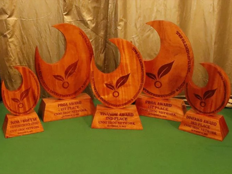 The five SEED to Sail competition awards are seen on table.