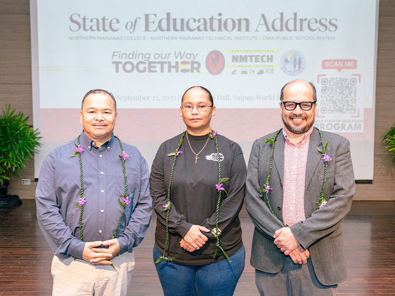 From left, Education Commissioner Dr. Alfred B. Ada, NMTech CEO Jodina Attao, and NMC president Dr. Galvin Deleon Guerrero stand in front of the crowd prior to the start of the Educational Summit at the Royal Taga Ballroom of Saipan World Resort last Thursday.