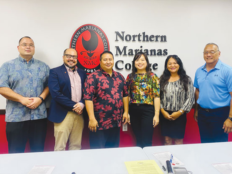 Gov. Ralph DLG Torres, center, is joined by House Speaker Edmund Villagomez (Ind-Saipan), left, NMC president Dr. Galvin Deleon Guerrero, second from left, NMC Board of Regents members Michelle L. Sablan, Irene T. Torres, and NMC Board of Regents chair Charles V. Cepeda, rightmost. (LEIGH GASES)