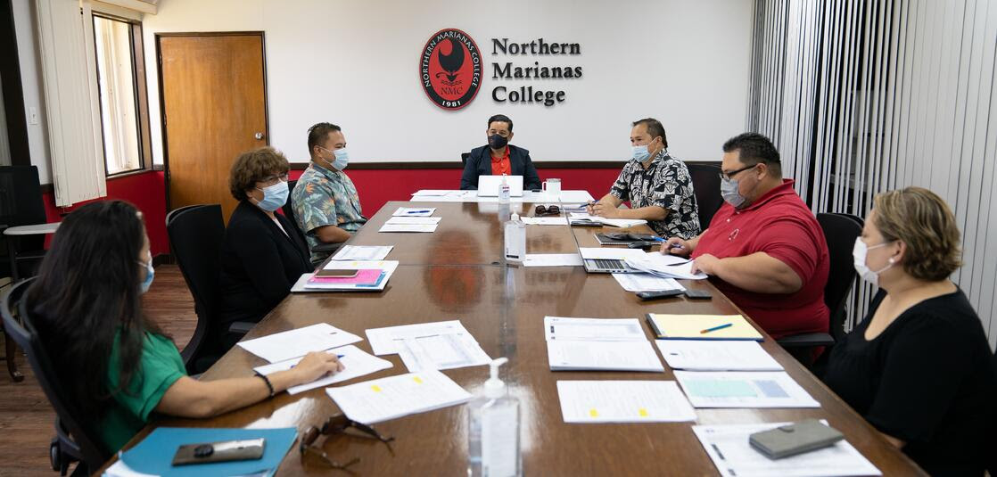 From left, Tayna Belyeu-Camacho, Jackie Quitugua, Manny Castro, Frankie Eliptico, Alfred Ada, Bill Torres, and Jessica Taylor. NMC Interim President Frankie Eliptico and PSS Commissioner Alfred Ada and their teams recently met about strengthening the alignment of NMC and PSS programs.
